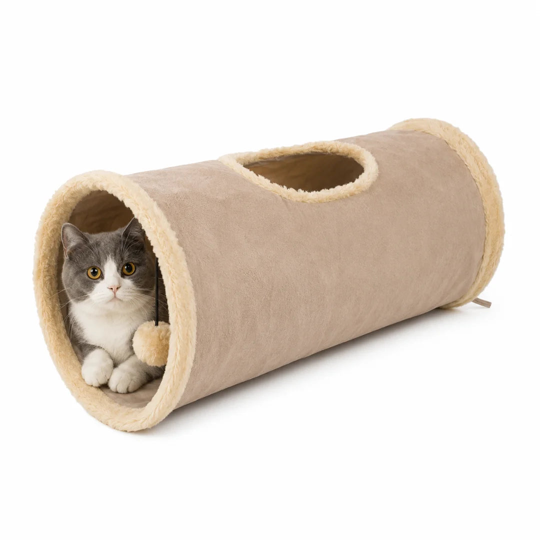 Grey and white cat relaxing comfortably inside a beige plush interactive cat tunnel.