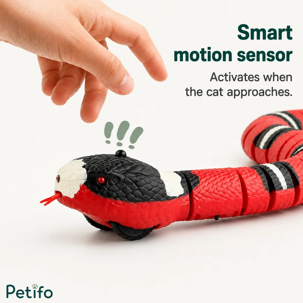 Smart motion sensor detail on the head of the electronic snake toy activated by movement.