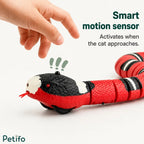 Smart motion sensor detail on the head of the electronic snake toy activated by movement.