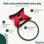 Close-up of the red blind dog harness showing the quick-release buckle and adjustable neck and chest straps.