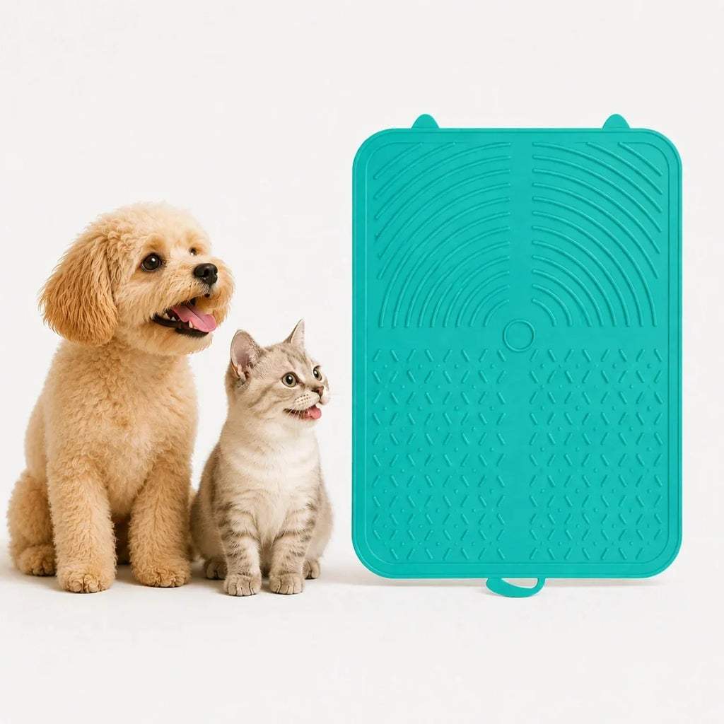 Adorable puppy and kitten sitting next to a teal Petifo silicone pet lick mat