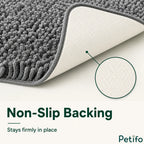 Close-up angle showing the textured anti-skid backing of the grey pet mat designed to prevent sliding on floors.
