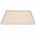 Beige rectangular pet silicone dining mat featuring a raised border and textured paw print pattern across the surface.