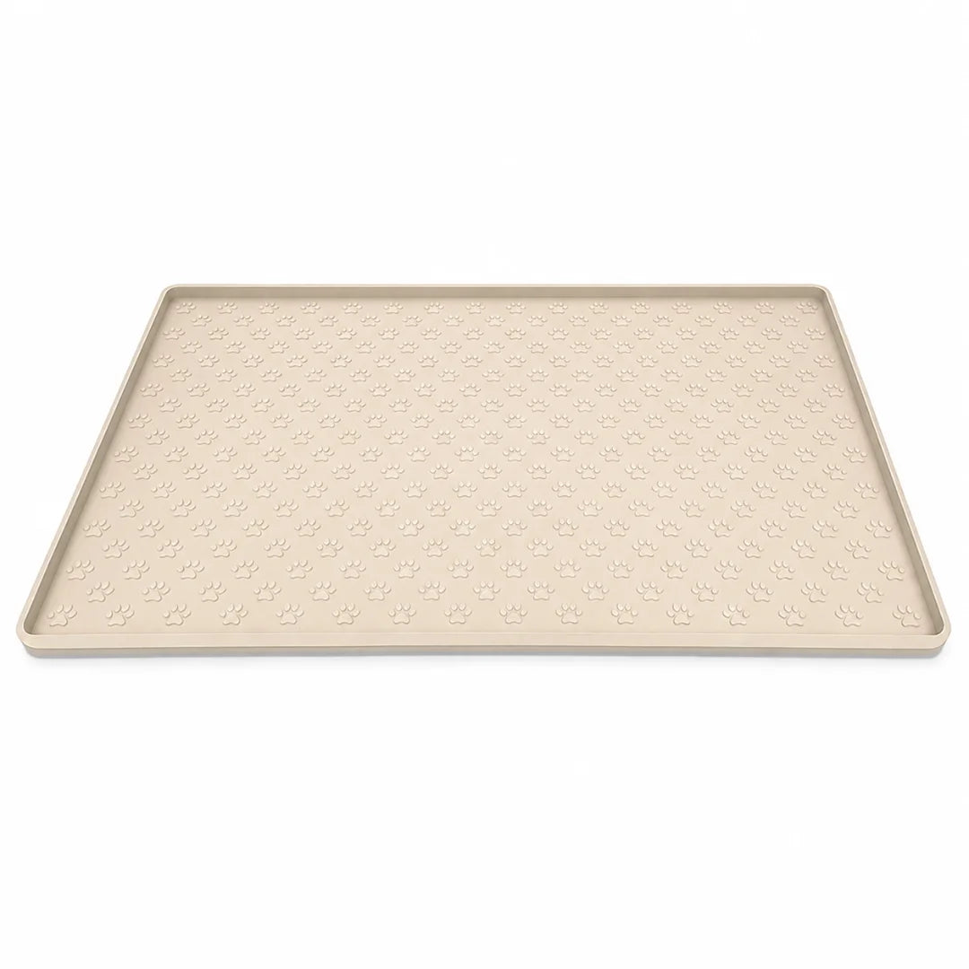 Beige rectangular pet silicone dining mat featuring a raised border and textured paw print pattern across the surface.