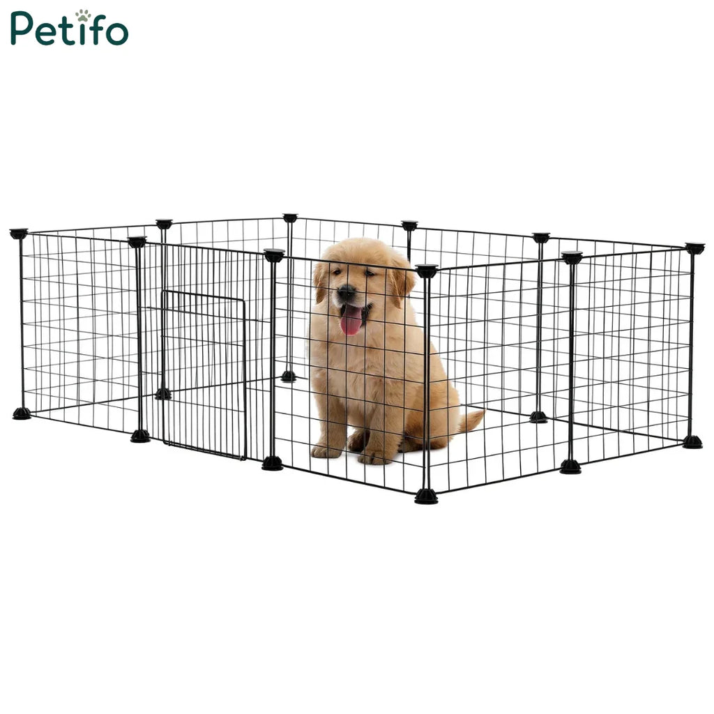 Golden retriever puppy sitting inside a Petifo black wire dog playpen with a front door.