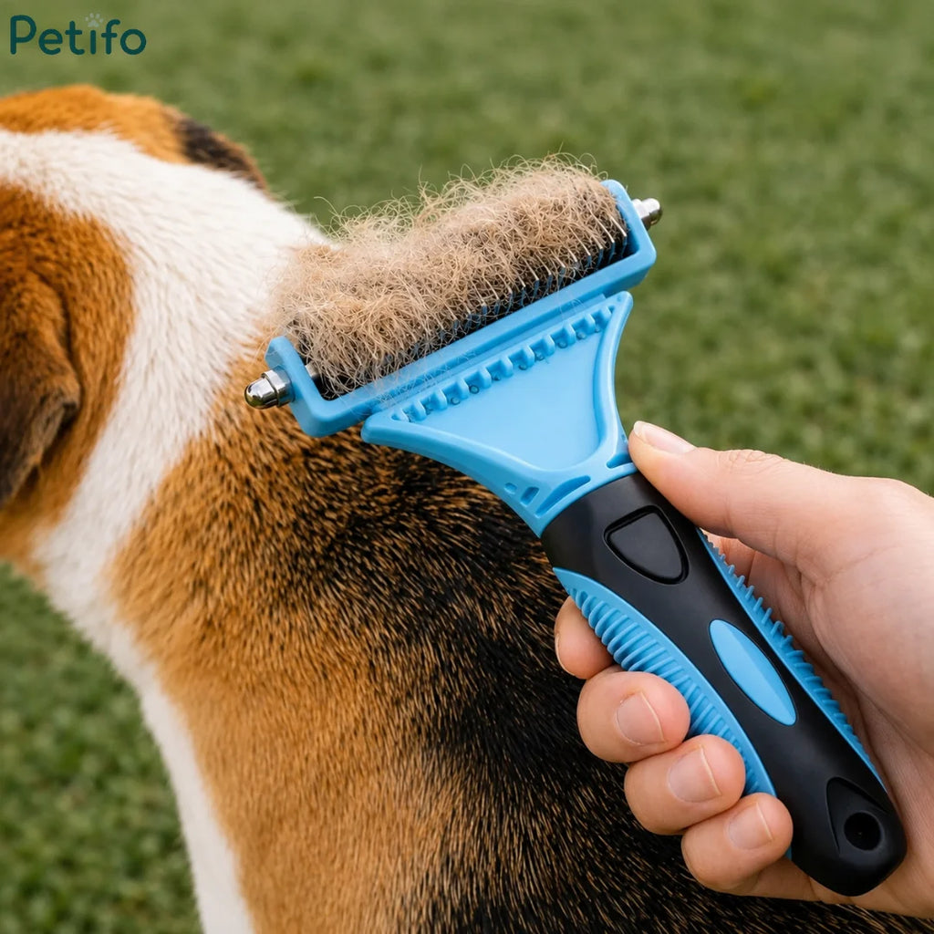 Petifo double-sided pet deshedding comb shown full of collected loose undercoat fur after brushing a brown and white dog outdoors.