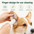 Close-up view of a corgi dog getting its ears cleaned with a textured, easy-to-use pet ear finger sleeve.