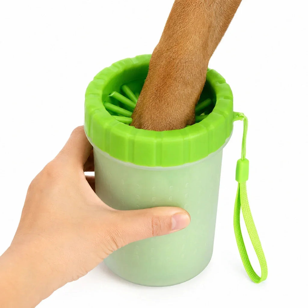 Close-up view of a dog's paw inside the silicone bristle insert of the Petifo paw cleaner