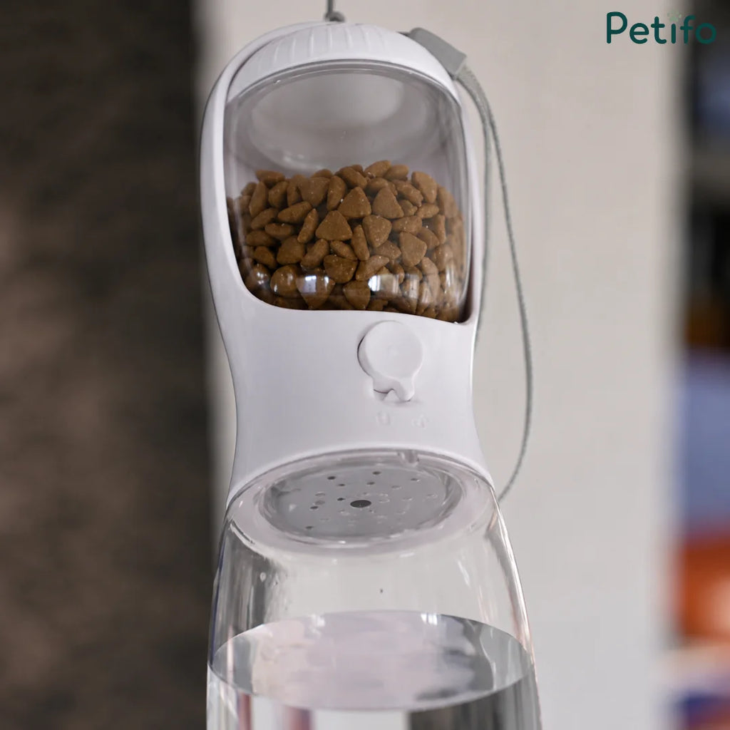 Close-up view of the Petifo bottle highlighting the built-in food container and water reservoir separation.