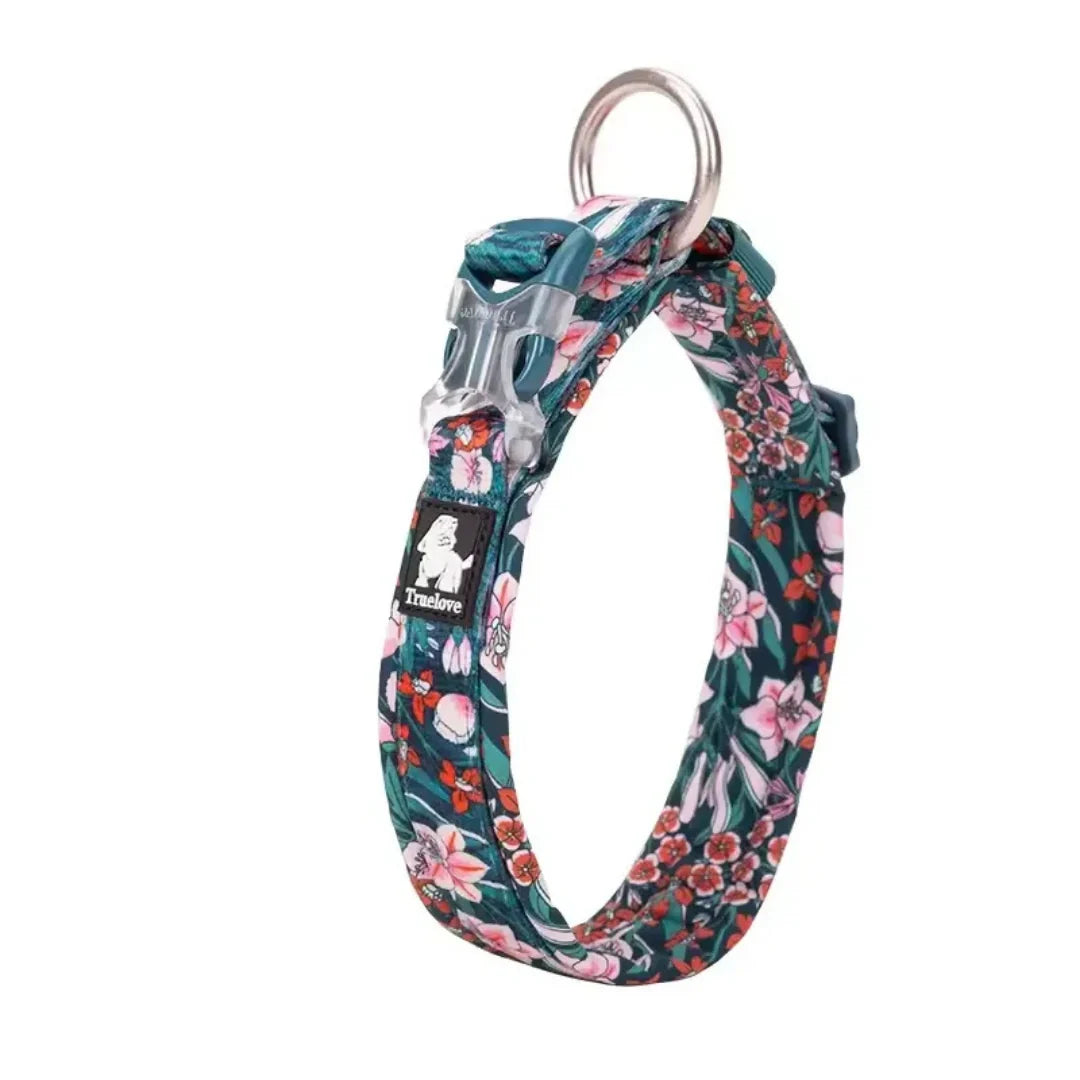 A studio product shot of the Saxony floral Petifo dog collar featuring a quick-release buckle and sturdy metal ring.