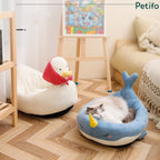 Cozy indoor pet setup featuring both the white duck and blue narwhal Petifo plush beds.