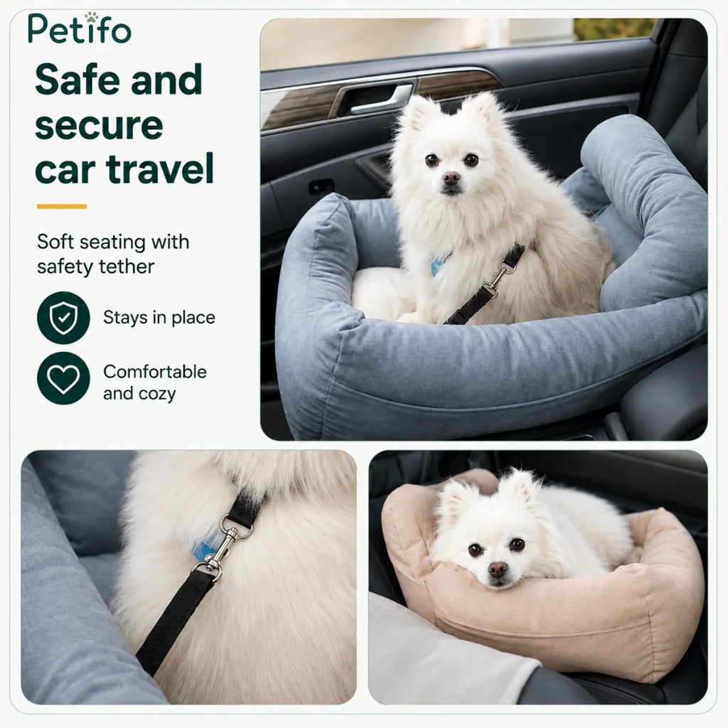 White fluffy dog sitting in a plush grey car booster seat featuring a secure safety tether and cozy interior cushions.