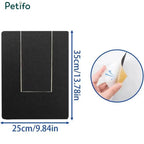 Dimension diagram of the black Petifo dog scratch pad showing a height of 35cm / 13.78in and a width of 25cm / 9.84in, with an inset showing the adhesive backing being peeled off.