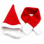 Matching red and white pet Santa hat and scarf set displayed together.