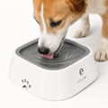 Dog drinking water from grey Els Pet no-spill floating disk bowl