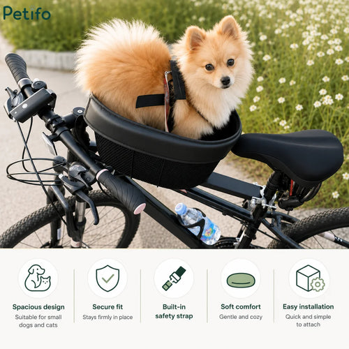 Fluffy Pomeranian dog sitting safely inside a black Petifo pet bike basket mounted on a bicycle during an outdoor ride.