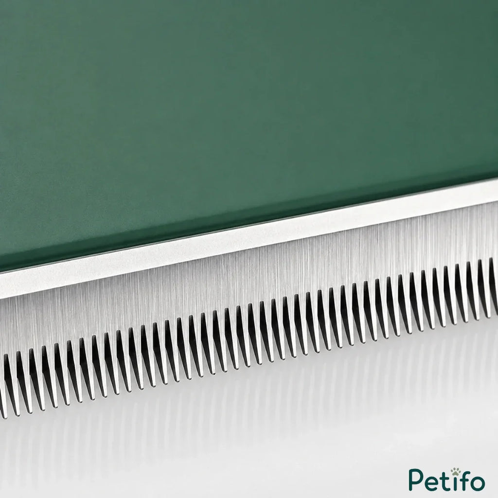 Macro close-up shot highlighting the fine, durable stainless steel teeth of the green pet grooming comb.