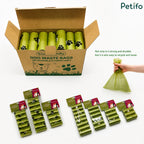 Open bulk cardboard box of eco-friendly dog waste bags with packaged bundles and a tied bag.
