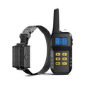 Black electronic dog training collar system complete with a handheld remote transmitter and adjustable strap.