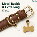 Close-up of the heavy metal buckle and extra D-ring designed specifically for attaching an ID tag.