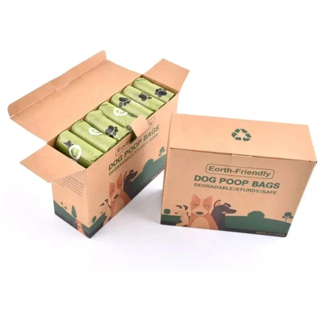 Cardboard bulk storage box filled with rolls of green biodegradable dog poop bags.