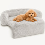 Fluffy grey dog sofa bed featuring a cute light brown poodle resting comfortably.