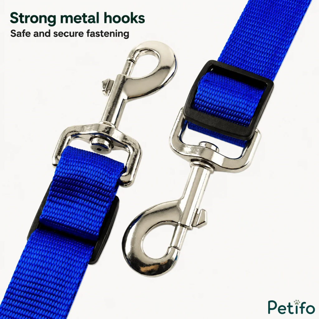 Detailed view of strong metal hooks and strap adjusters for equestrian gear.
