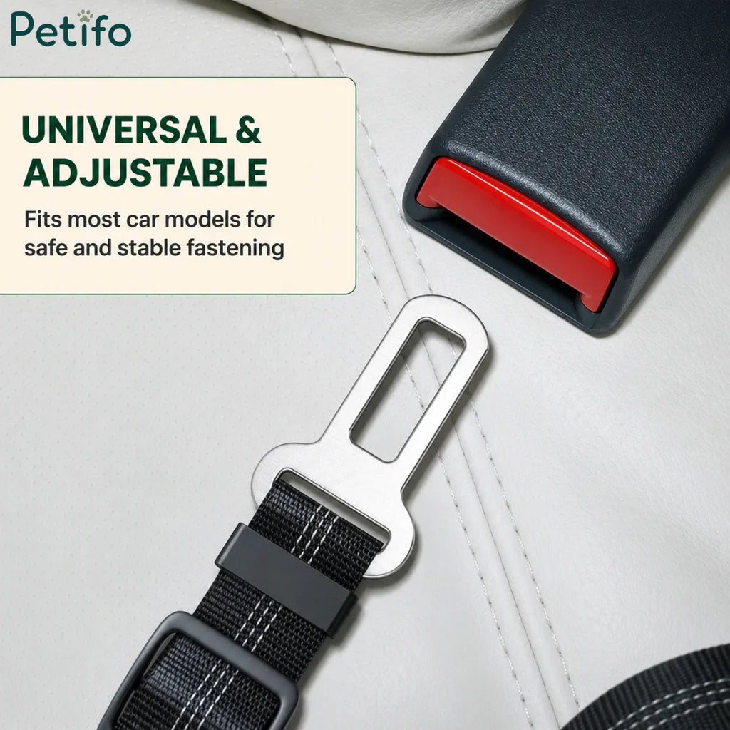 Close-up of universal metal seat belt buckle inserting into a car receiver for pet safety.