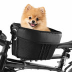 Petifo black multifunctional pet bike basket mounted on a bicycle frame against a white background, featuring a happy small Pomeranian dog sitting inside with its tongue out.