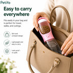 Demonstration of how easily the slim pink Petifo bottle slips into a handbag for travel and daily walks.