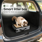 Smart portable cat litter box set up inside a car trunk for travel adventures.