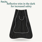Flat lay view of the black dog winter coat showcasing high-visibility reflective trim for nighttime safety.