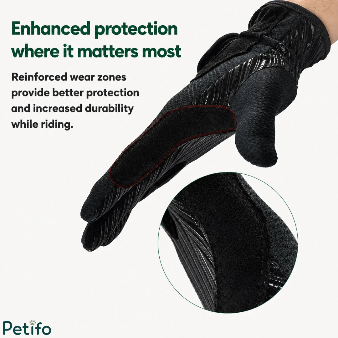 Reinforced wear zones on the fingers and thumb of a black equestrian riding glove for enhanced durability.