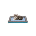 A cute grey tabby cat lying relaxed on a small blue and grey striped cooling pet bed against a white background.