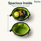 A top view displaying the spacious inside of a dog treat pouch filled with toys, treats, and accessories.