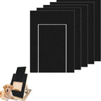 Stack of black Petifo replacement scratch pads displayed alongside an assembled wooden dog scratch board and a golden retriever.