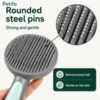 Close-up of the Petifo pet brush showcasing its rounded steel pins designed to be strong, gentle on the skin, and effective at removing loose hair.