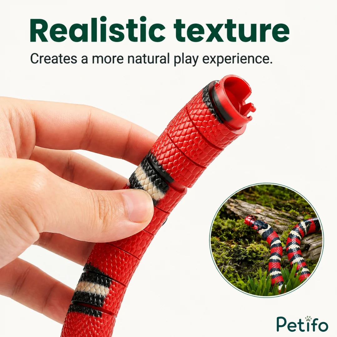 Close-up hand view showing the realistic textured segments of the interactive snake toy.
