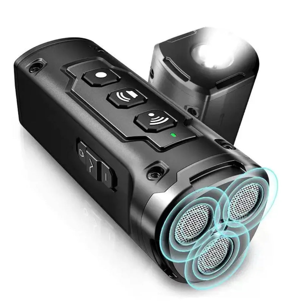 Handheld black ultrasonic anti-barking device showing three emitters and a built-in flashlight.