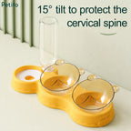 Yellow Petifo pet feeding station highlighting its 15-degree tilt design to protect the cervical spine.