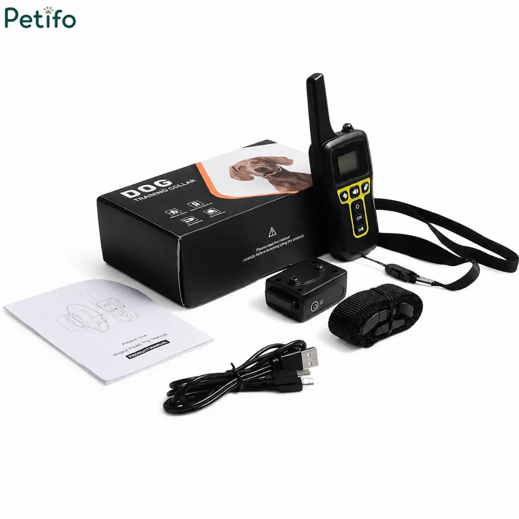 Complete unboxing kit layout featuring the training collar receiver, digital remote, box, USB cable, and manual.