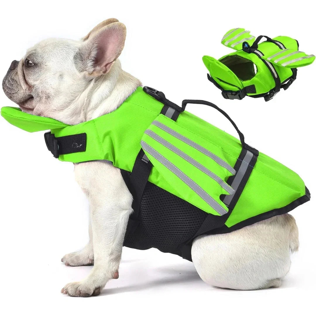 Side profile view of a French Bulldog displaying a vibrant green dog life vest equipped with a rescue handle and chin float.