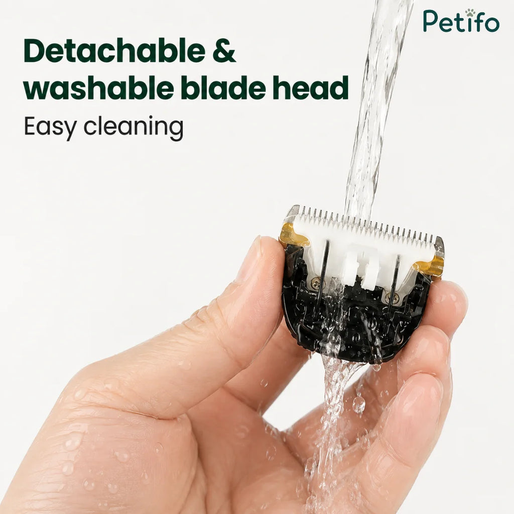 Detachable and washable dog clipper blade head being rinsed under running water.