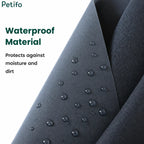 Close-up of waterproof black fabric material covered in water droplets for moisture protection.