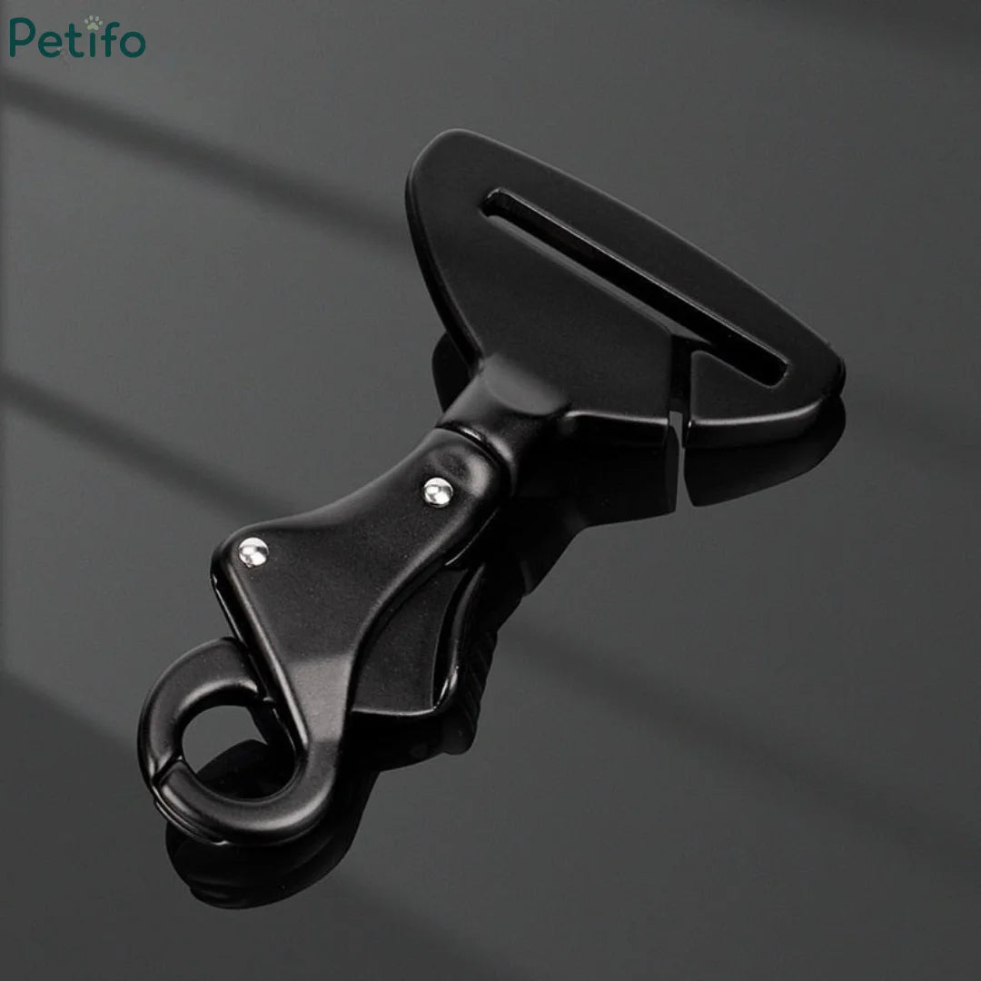 Petifo heavy-duty black metal dog seat belt clip adapter on dark reflective background