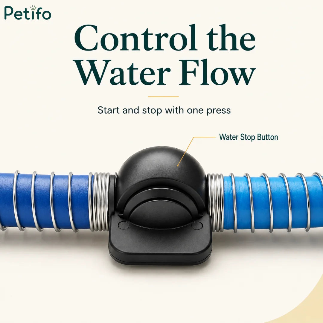 Close-up of the integrated black water stop button positioned along the blue hose.