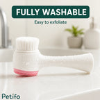 Petifo fully washable 2-in-1 pet grooming brush resting on a clean white countertop near a sink.
