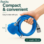 Compact 210 cm blue pet shower hose and glove coiled up for convenient storage and travel.
