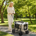 Woman walking along a sunny park pathway while pushing the Petifo beige multi-pet stroller carrying a small dog and cat.